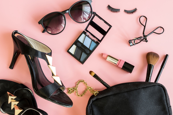 women cosmetics and fashion items isolated on pink background, Top view