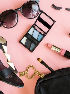 women cosmetics and fashion items isolated on pink background, Top view